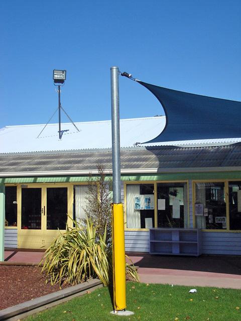 Shade sail with padding around the post